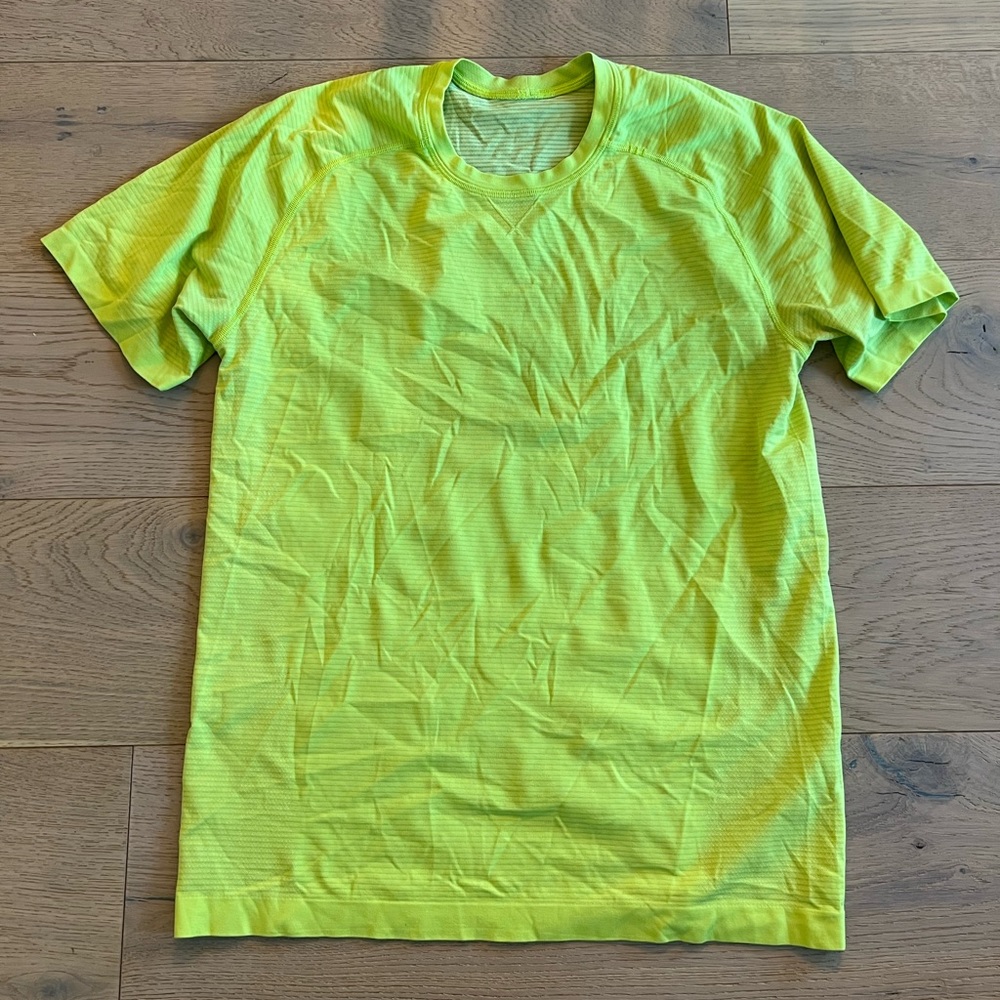 Lululemon mens yellow shirt. Highlighter yellow. Lightly used. Great condition.